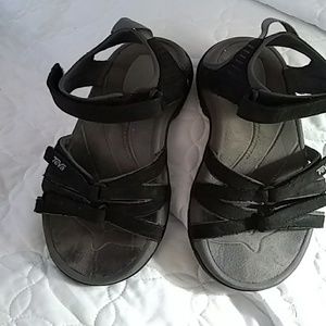 A pair of Teva active wear sandals.